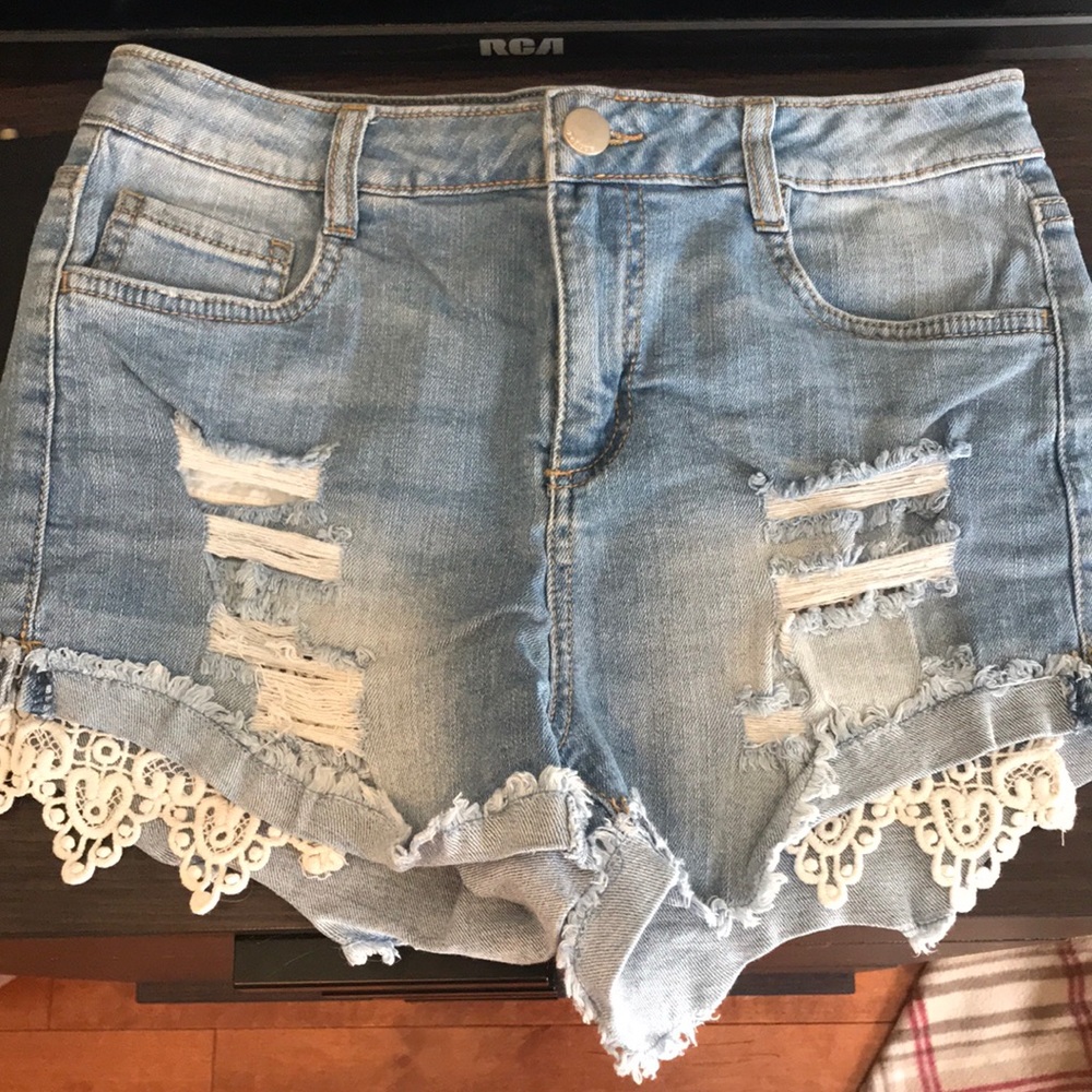 Gently worn distressed high waisted jean shorts